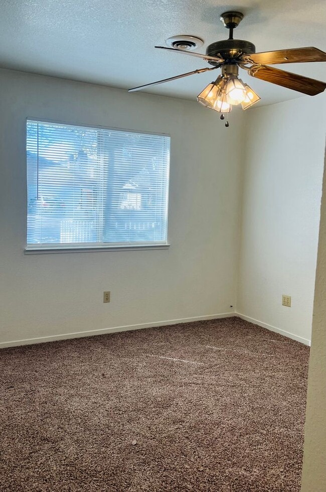 Photo - Spacious 2 Bedroom/2 bath duplex with a 2 car garage and laundry hook ups in a great North Modest...