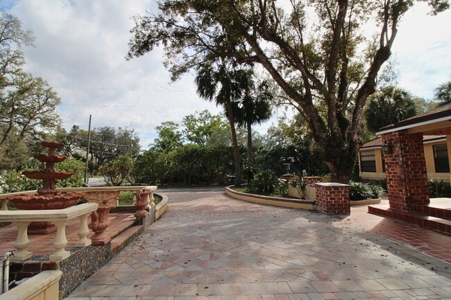 Photo - Stunning 3-Bed, 2-Bath Spanish-Inspired Custom Home with Elegant Gardens & Fountains