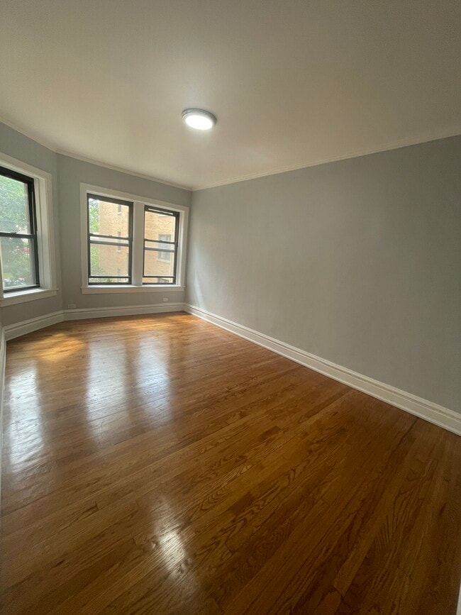 Building Photo - 7327 N Honore St Unit 2-B