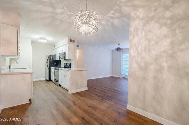 Building Photo - 5995 N 78th St Unit 1107