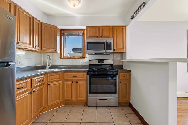 Photo - 60-63-63 60th Ln Unidad 3