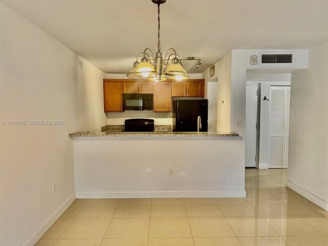 Building Photo - 10700 SW 108th Ave Unit C209