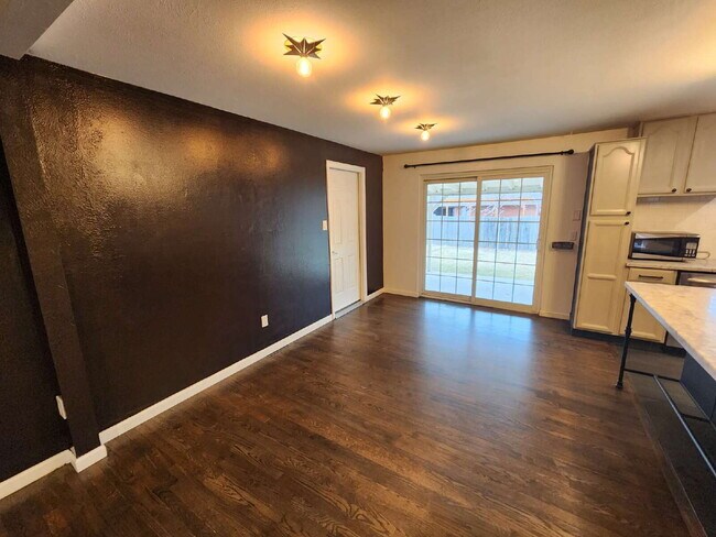 Photo - Spacious 5 Bed Home with Finished Basement, Multiple Living Areas & Private Backyard