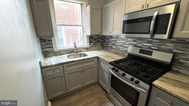 Building Photo - 4724 Frederick Ave Unit 1 Rental