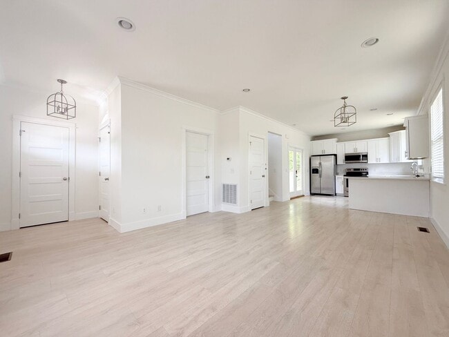 Photo - Pet-Friendly 3-Bedroom Home with Modern Features, Covered Deck & Bright Open Space