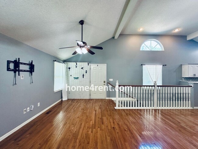 Photo - Overland Park Raised Ranch, Primary Suite on the Main Level, Updated Kitchen and Fenced Yard!