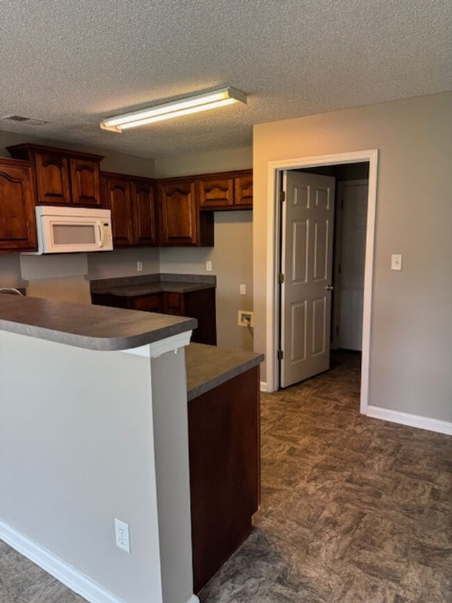 Photo - Renovated 4 Bedroom 2 Bath Home with Upsta...