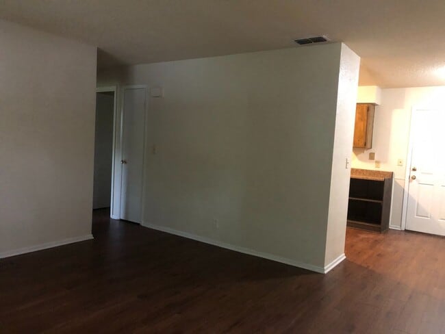 Photo - SPACIOUS 3BR/1.5BA w/Carport, Beautiful Wood Finish Flooring, Privacy Fenced Backyard! NO APP FEE!