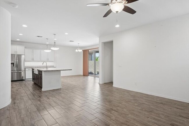 Photo - Beautiful newer-build home located in the highly desirable East Mesa area in Eastmark. - 55+ Comm...
