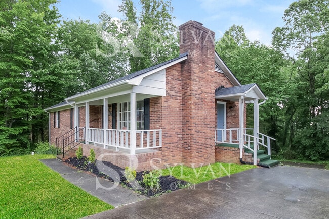 Photo - Enjoy living the good life in this 4 BR, 3 BA brick rancher