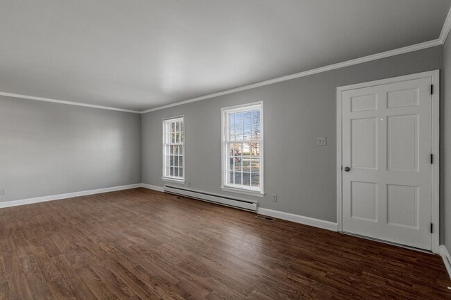 Photo - Large Brick Ranch, New Wood Like Flooring Throughout, Just Painted, LR, Den, Sun Room, Carport!