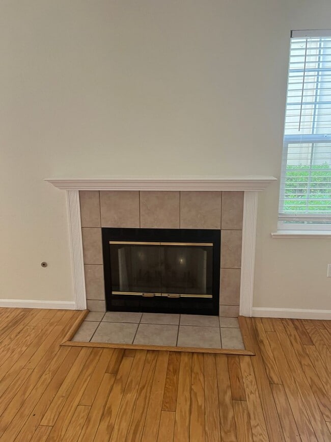 Photo - 3 bedroom 2.5 bath town home with large bonus living room and 2 car garage parking