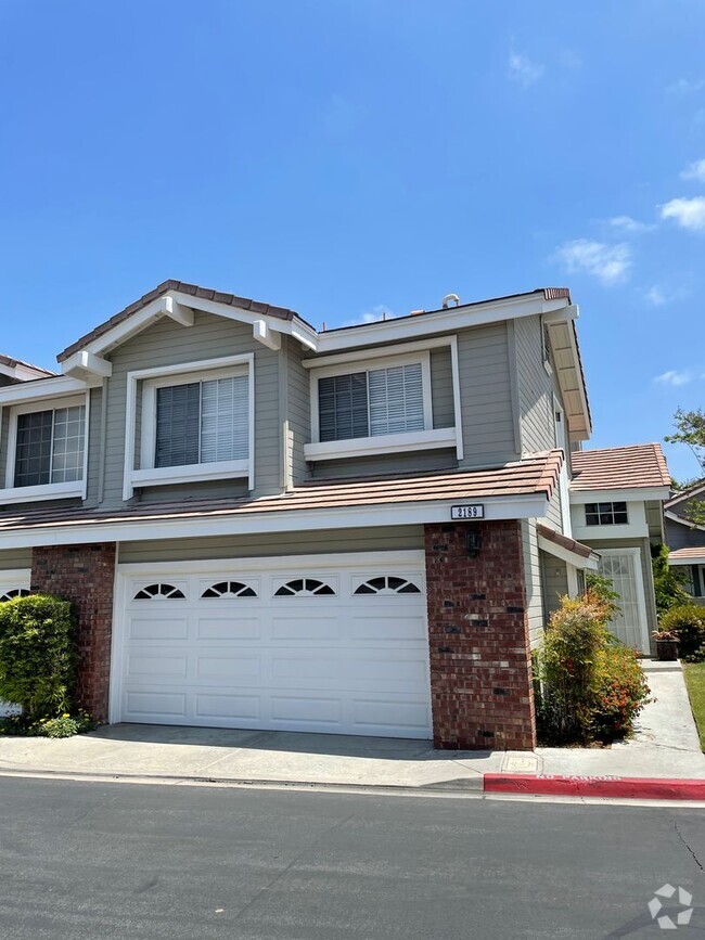 Building Photo - Two Story End Unit Townhome with Two Car G...