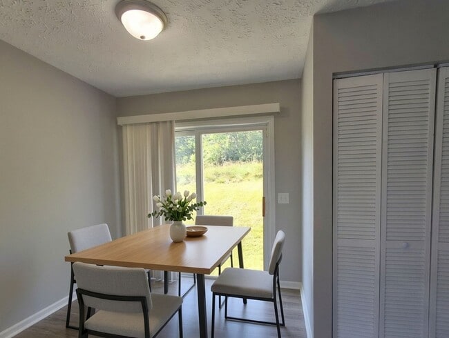 Photo - 4 Bed / 2 Full Bath House with Brand-New Kitchen, Attached Garage, and Full Basement - Built 2001