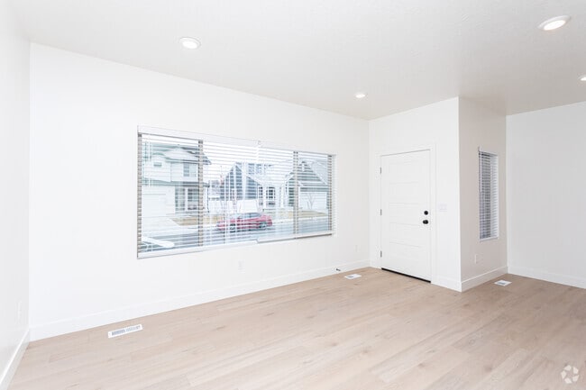 3BR, 2.5BA - 1,631SF - Living Room - Slatewood Townhomes