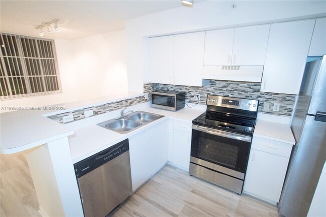 Building Photo - 12130 St.Andrews Pl Unit 101