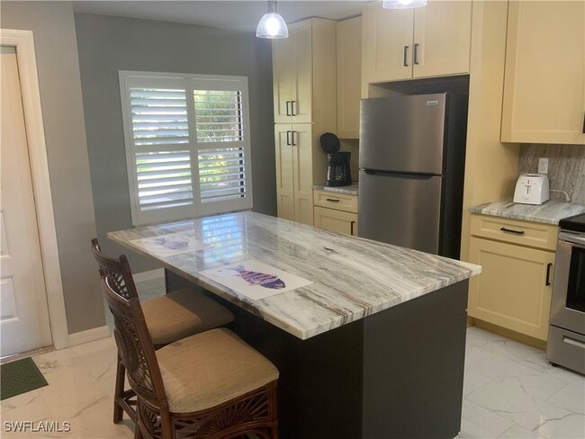 Building Photo - 12170 Kelly Sands Way Unit 705