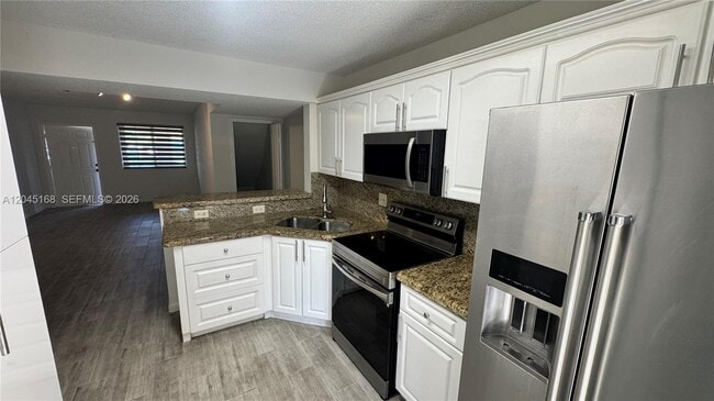 Photo - 7439 W 22nd Ave Unit 103