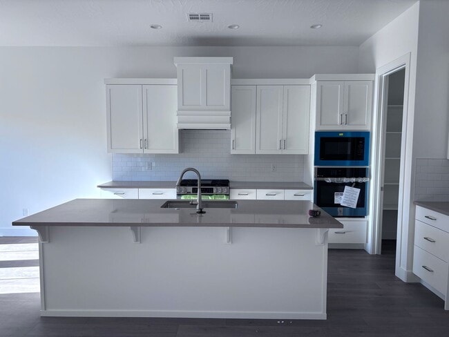 Photo - new single story 4 bed 3 bath with 3 car garage and community swimming pool