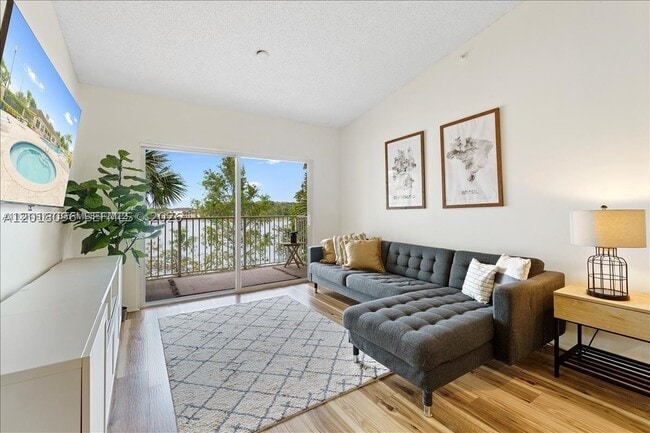 Building Photo - 5065 Wiles Rd Unit 308