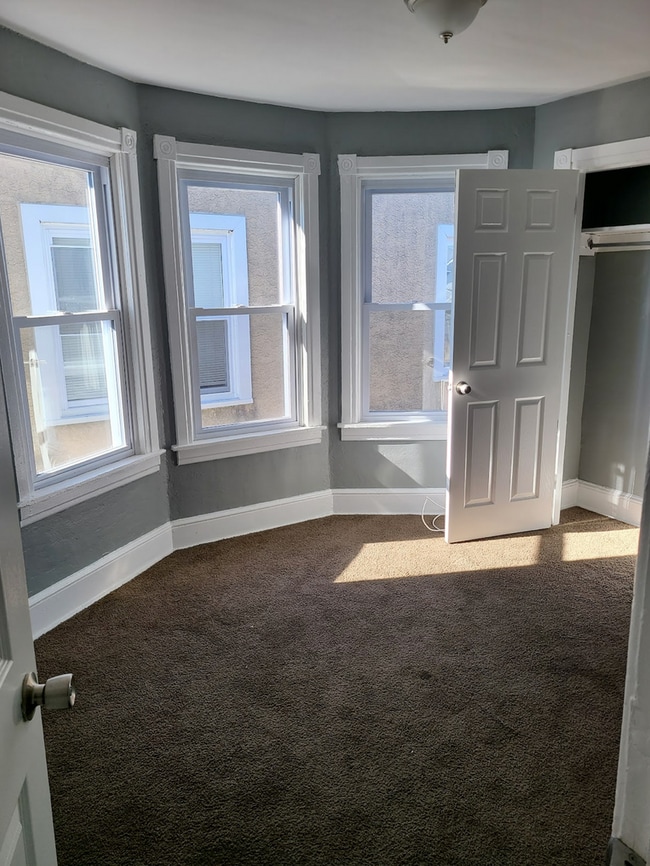 Photo - Twin home with updated kitchen, washer/dry on first floor, private back yard and porch.