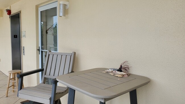 Building Photo - 3802 Gulf of Mexico Dr Unit A204