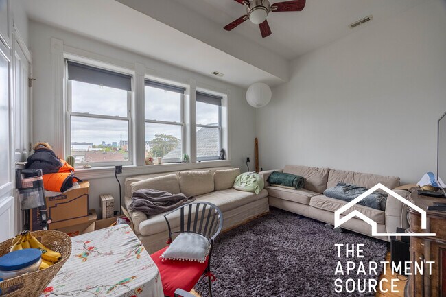 Building Photo - 1653 S Throop St Unit 3F Rental