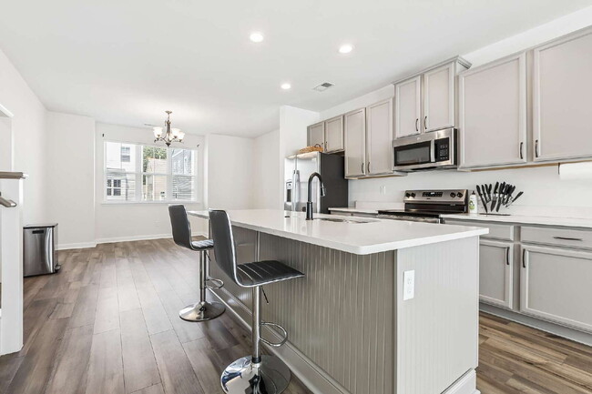 Building Photo - "Spacious 4-Bedroom Condo with 3.5 Baths in Prime Suffolk Location – 2081 Sq Ft of Comfort and St... Unit 100