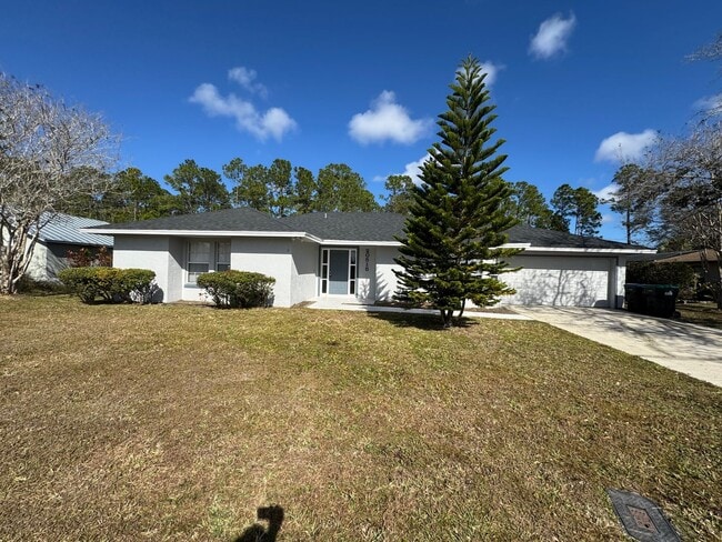 Building Photo - Spacious 3/2 Home with Screened Patio and Large Yard *Lawn Care Included!*