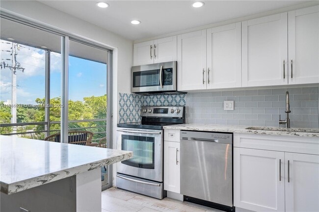Building Photo - 1750 NE 115th St Unit 307