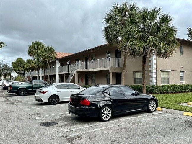 Building Photo - 8850 Royal Palm Blvd Unit 203