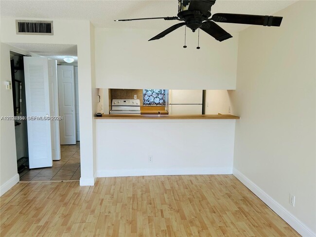 Building Photo - 8600 N Sherman Cir Unit 504