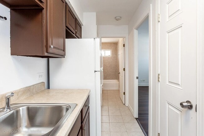 Photo - 7900 S 83rd Ct Unit 5