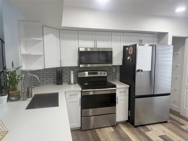 Building Photo - 13028 SW 88th Ln Unit A205