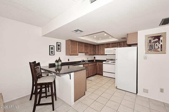 Building Photo - 7910 E Camelback Rd Unit 310