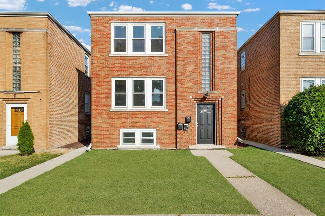 Building Photo - 5527 S Mason Ave Unit G