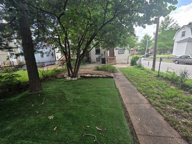 Photo - 2 bed/1 bath, Single-family Home! Modern and spacious with off-street parking and a relaxing back...