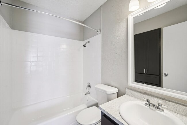 Elevate your daily routine at The Riley Apartments with modern bathroom designs that combine style and functionality. Enjoy spacious layouts and high-end finishes. Schedule your tour today and envision your new home!