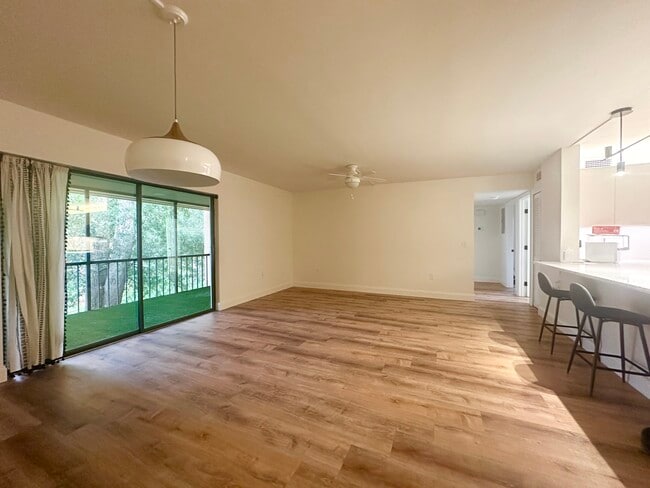 Living room with balcony access - 630 Cranes Way Unit Cranes Roost Apt 306