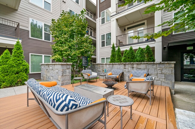 Outdoor Lounge with Firepit and Grilling Stations