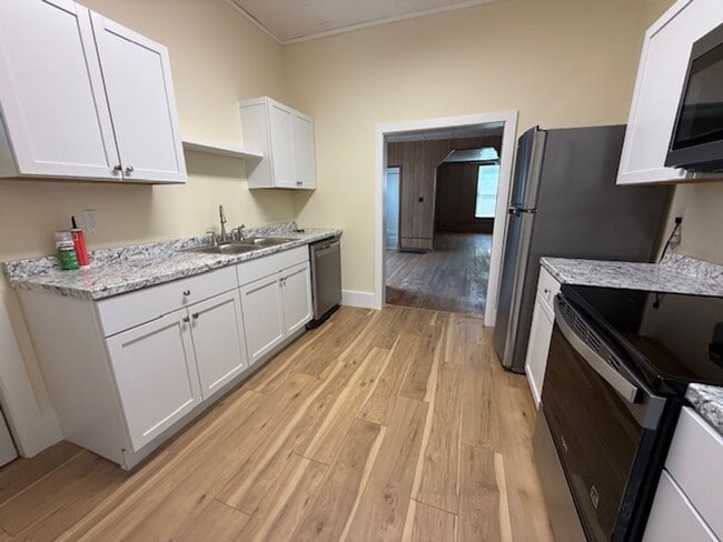 Photo - Classic Hardwood Floors, Fenced Yard & 2-Car Garage