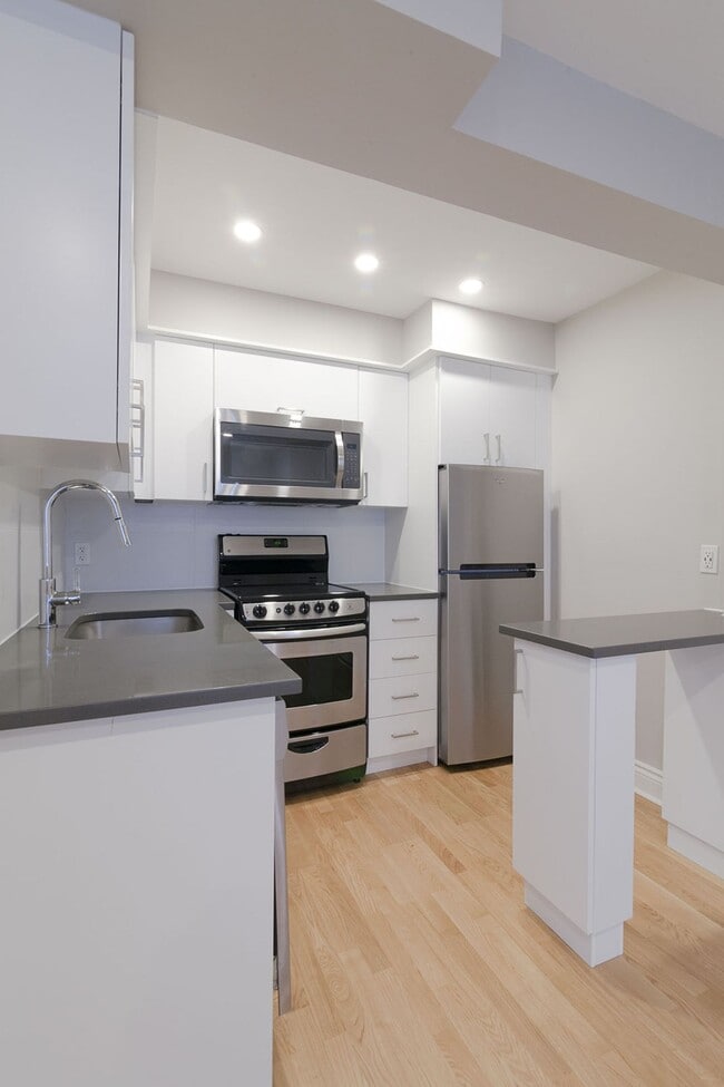 Photo - 25 Av des Pins O Unité 545