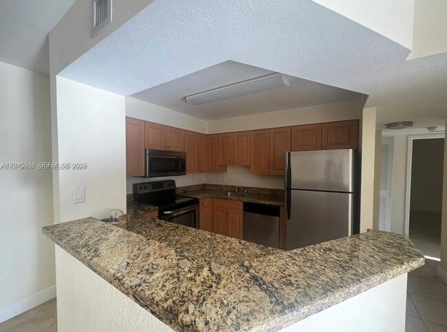 Building Photo - 5112 NW 79th Ave Unit 202