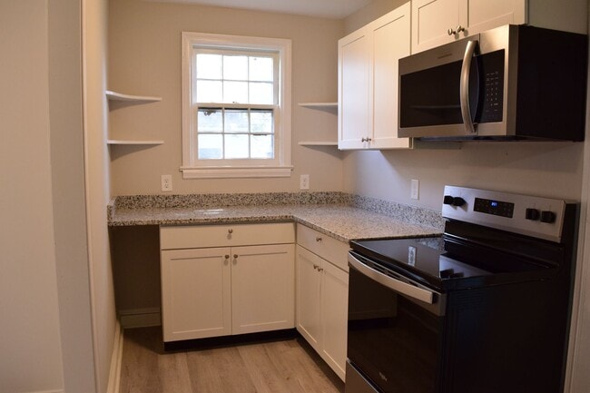 Photo - Charming Northside Two-Story Brick Home With 2 car garage and basement