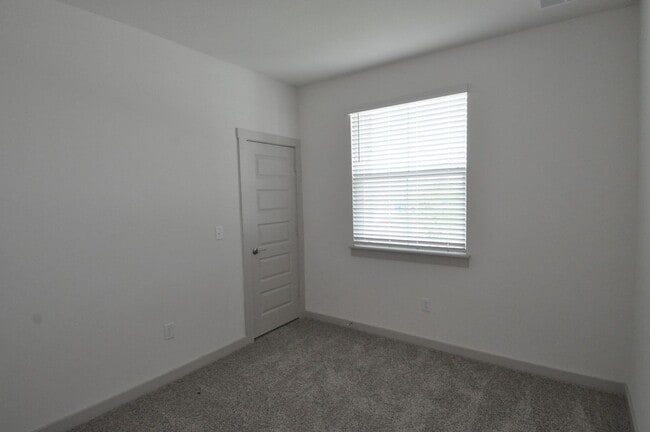Photo - Home has an amazing entrance leading to the large family room open to the kitchen and dining room