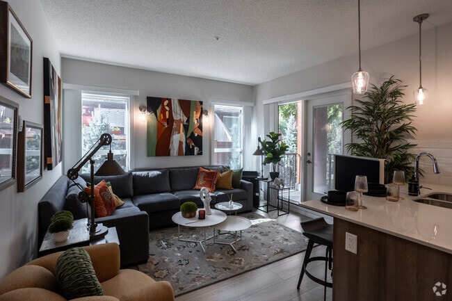 2BR, 2BA - 877SF - Living Room - Abbey Park