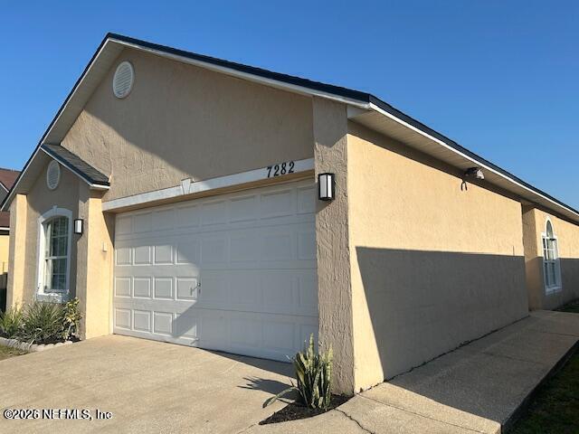 Building Photo - 7282 Lawn Tennis Ln