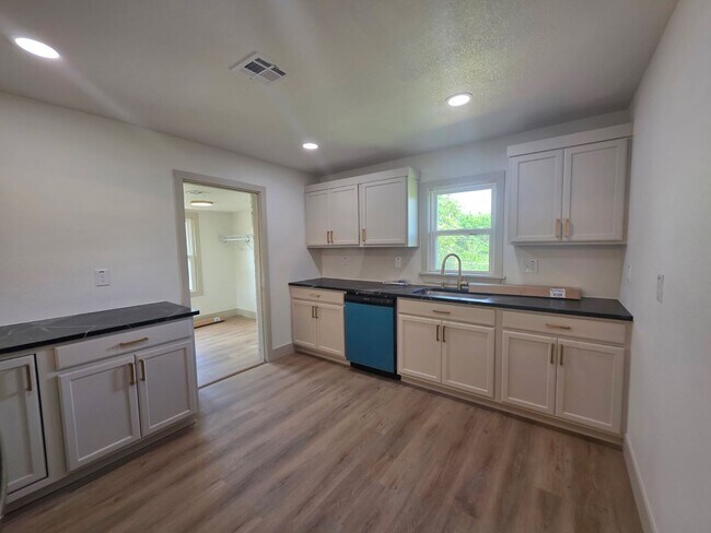 Photo - Gorgeous 3 bedroom 1 bath Duplex on street level (separate studio located below).