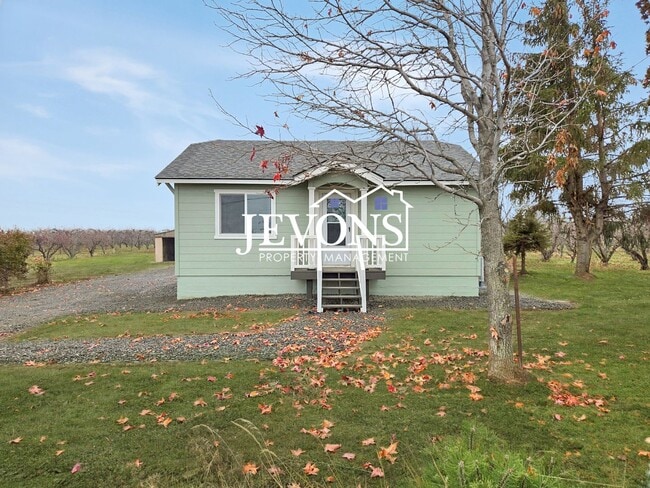 Building Photo - 3 bedroom home with washer and dryer – 1-acre lot next to an orchard – Large and small pets allowed!
