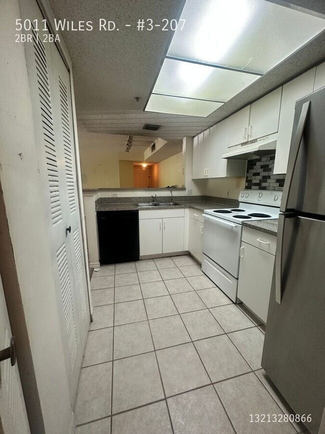 Photo - 5011 Wiles Rd Unidad #3-207